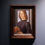 Sandro Botticelli's 15th-century painting called "Young Man Holding a Roundel" is displayed at Sotheby's on Sept. 23, 2020, in New York. The painting will go on auction next year and art watchers will be seeing if it fetches more than its eye-watering $80 million estimate, despite the pandemic. Botticelliâ€™s 15th-century portrait of a nobleman in â€œYoung Man Holding a Roundelâ€ is the highlight of Sothebyâ€™s Masters Week sale series in New York in January. (AP Photo/Seth Wenig)