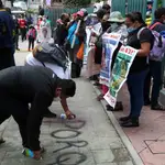 Manifestantes piden justicia para los 43 estudiantes asesinados en Iguala en 2014