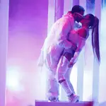 FILE - Anuel AA, left, kisses Karol G as they perform a medley at the Billboard Latin Music Awards in Las Vegas on April 25, 2019. Karol G. has four Latin Grammy nominations, including two shared with Nicki Minaj. Karol Gâ€™s fiancÃ©, Puerto Rican rapper-singer Anuel AA, marked a major breakthrough this year as a first-time nominee. He scored seven nominations, including a bid for best new artist. (Photo by Eric Jamison/Invision/AP, File)