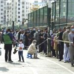 Residentes de Qingdao hacen cola para someterse a un test