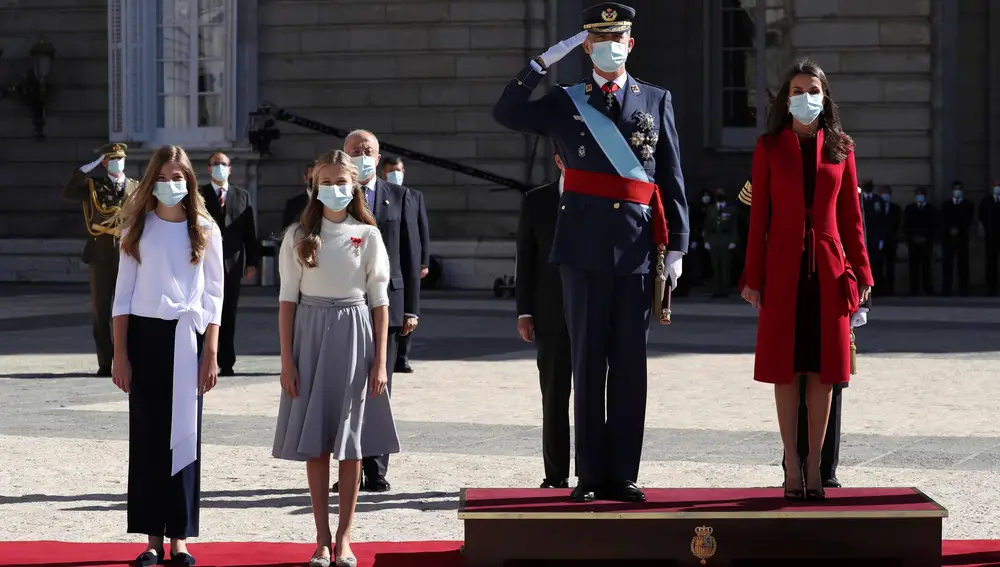 Spain's King Felipe VI, second right, flanked by Queen Letizia, right, Princess Leonor, second right, and Princess Sofia attend a military parade on 'Dia de la Hispanidad' or Spain's Hispanic Day in Madrid, Monday, Oct. 12, 2020. Spain's National Day, an annual public holiday commemorates Christopher Columbus' arrival in the New World and also Spain's armed forces day. (Kiko Huesca/Pool via AP)