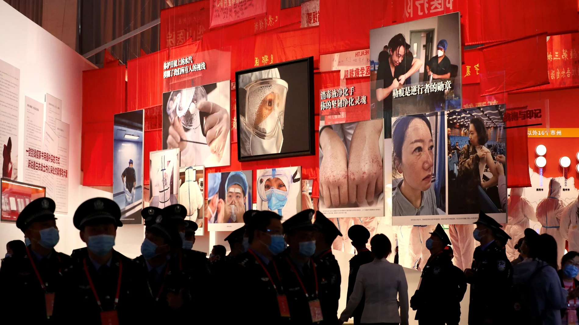 Visitors are seen at a newly opened exhibition on Wuhan's fight against the coronavirus disease (COVID-19) outbreak, at an exhibition centre in Wuhan, Hubei province, China October 15, 2020. China Daily via REUTERS ATTENTION EDITORS - THIS IMAGE WAS PROVIDED BY A THIRD PARTY. CHINA OUT.