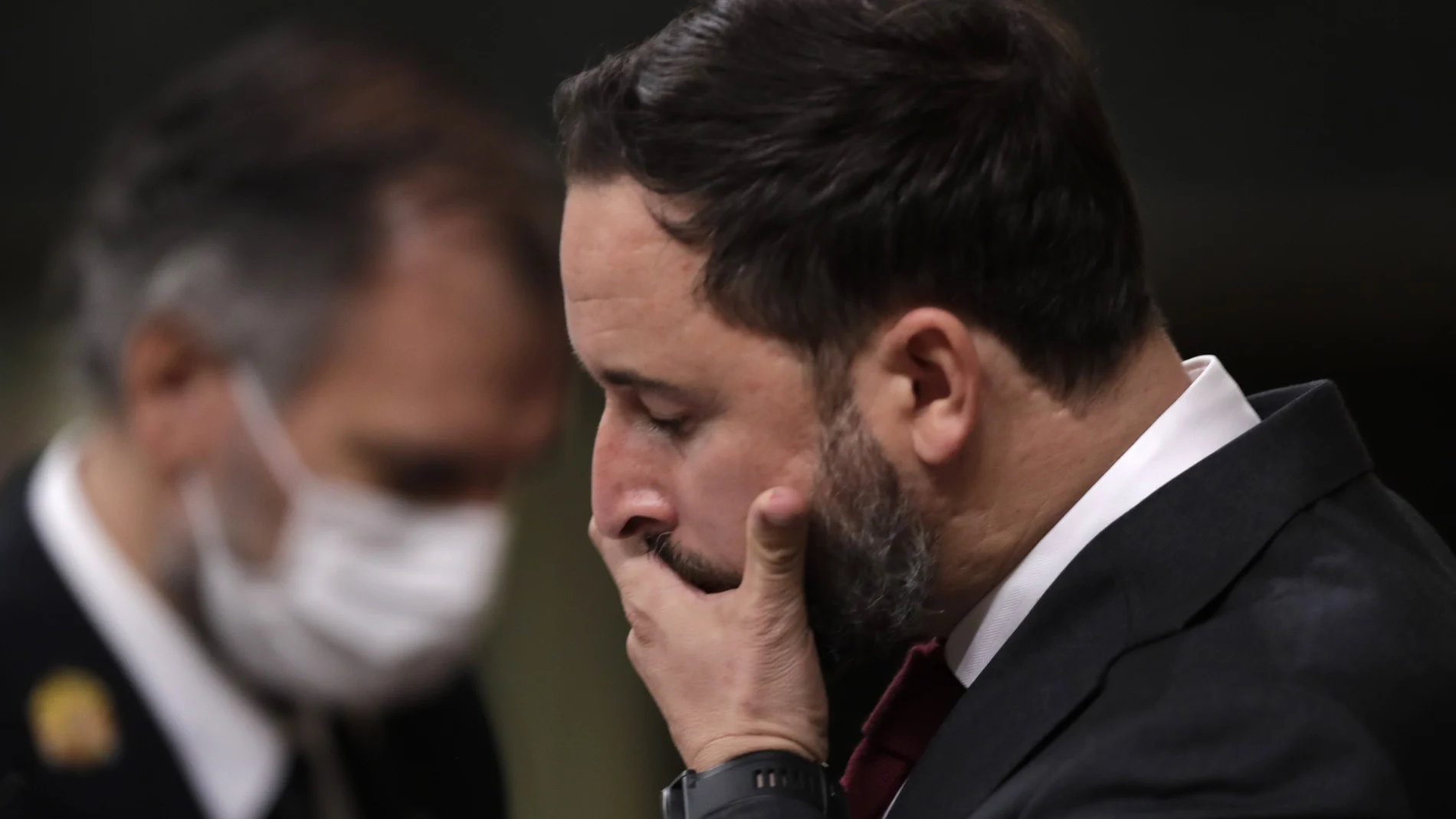 Vox party leader Santiago Abascal pauses while giving a speech during a parliamentary session in Madrid, Spain, Wednesday Oct. 21, 2020. Spanish Prime Minister Pedro Sanchez faces a no confidence vote in Parliament put forth by the far right opposition party VOX. (AP Photo/Manu Fernandez, Pool)