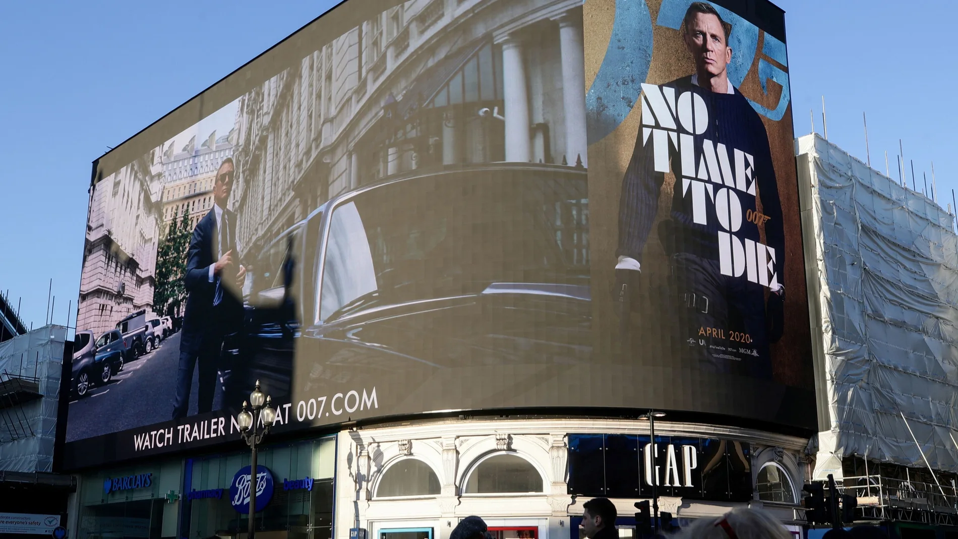 A film trailer for the 25th instalment in the James Bond series entitled "No Time to Die" is displayed at Piccadilly Circus in London.