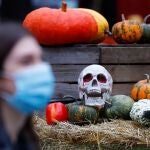 Pumpkins and a mock up skull are seen ahead of Halloween in Berlin