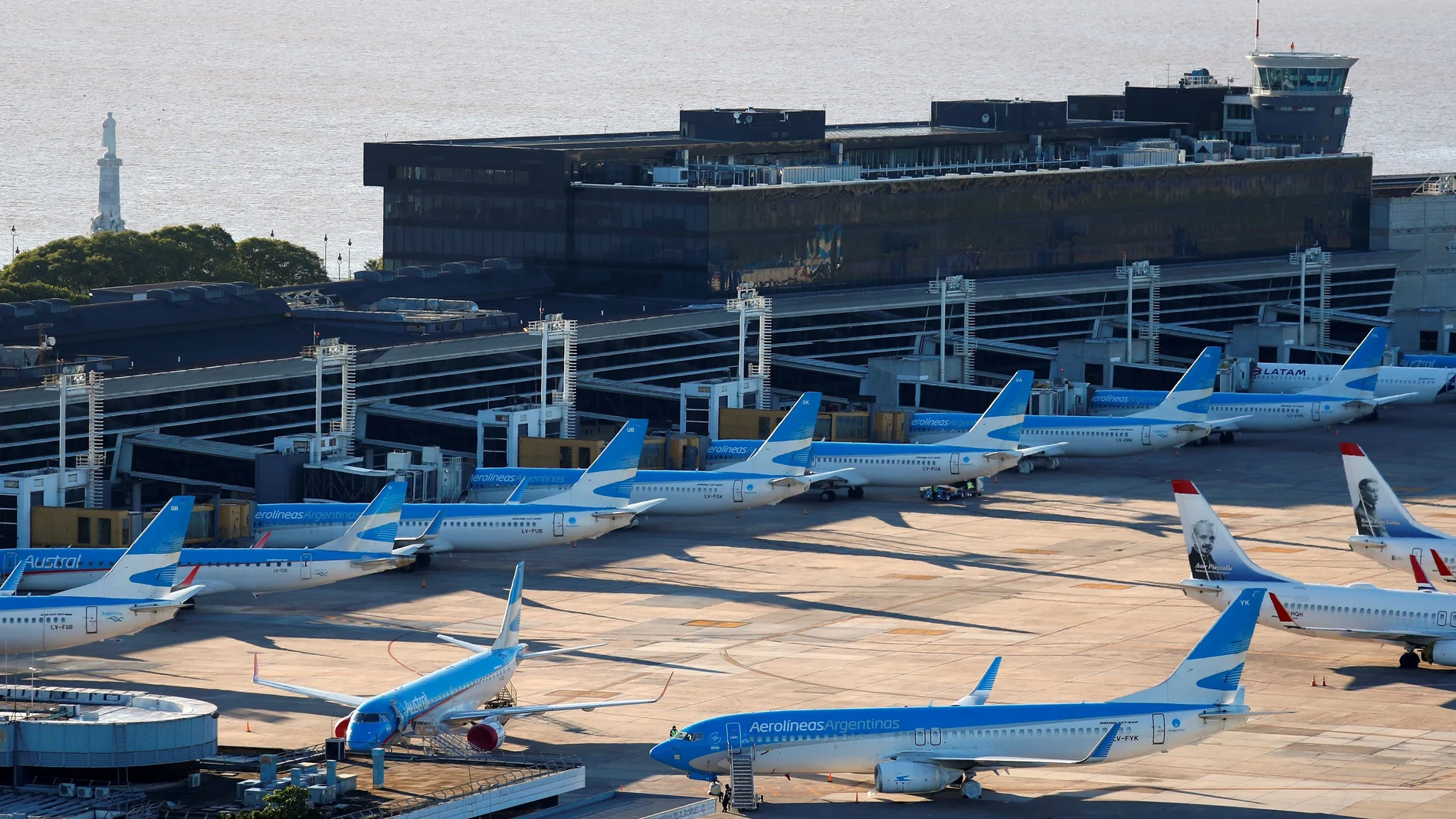 FILE PHOTO: Airplanes are seen parked at Jorge Newbery domestic airport, as the spread of the coronavirus disease (COVID-19) continues, in Buenos Aires, Argentina April 29, 2020. REUTERS/Agustin Marcarian/File Photo