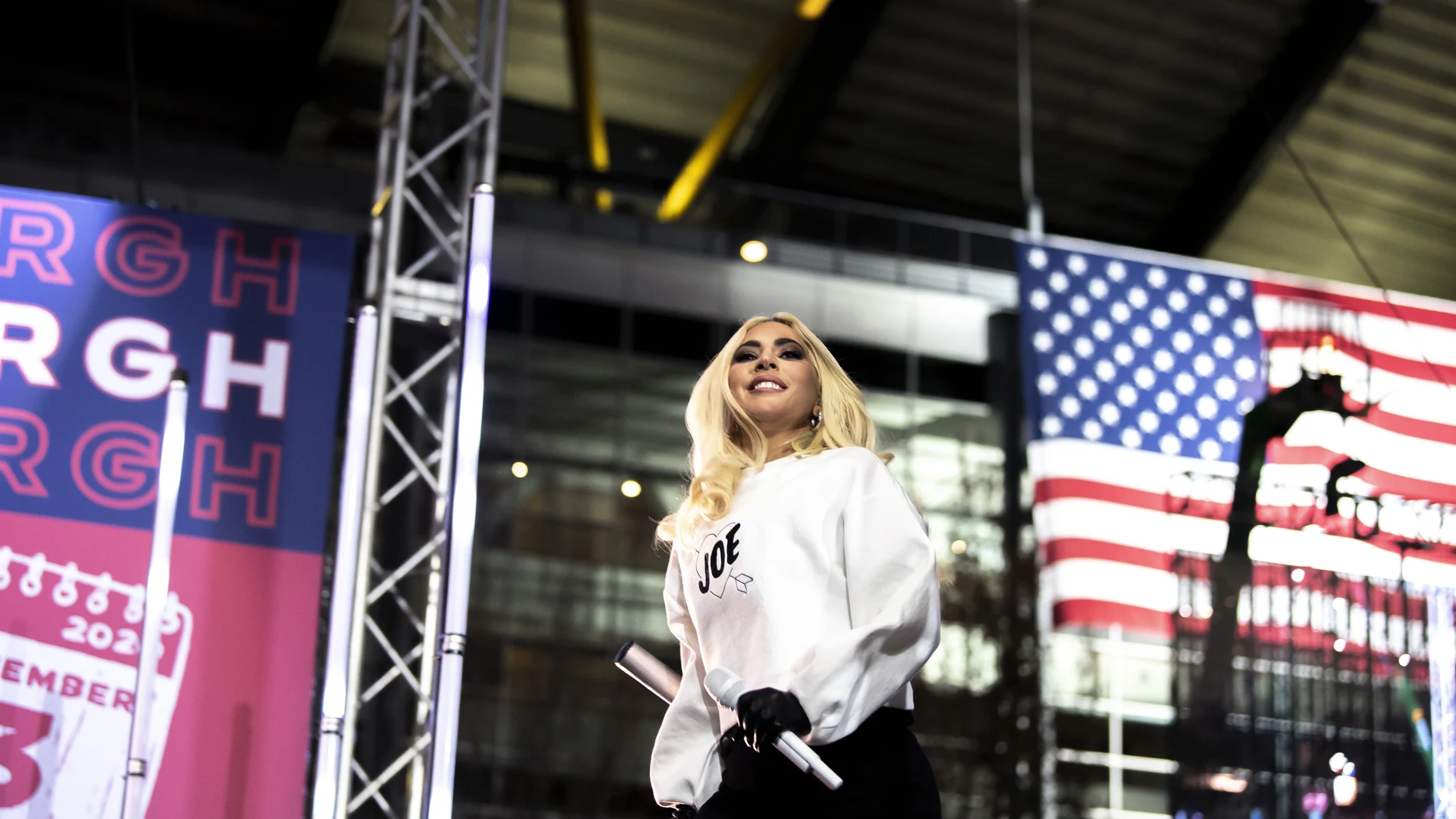 Lady Gaga takes the stage to perform during a drive-in campaign event for Democratic presidential candidate and former Vice President Joe Biden in the parking lot outside of Heinz Field on Pittsburgh's North Shore, Monday, Nov. 2, 2020. (Alexandra Wimley/Pittsburgh Post-Gazette via AP)