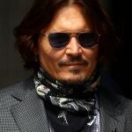 FILE PHOTO: Actor Johnny Depp arrives at the High Court in London, Britain July 23, 2020. REUTERS/Hannah McKay/File Photo