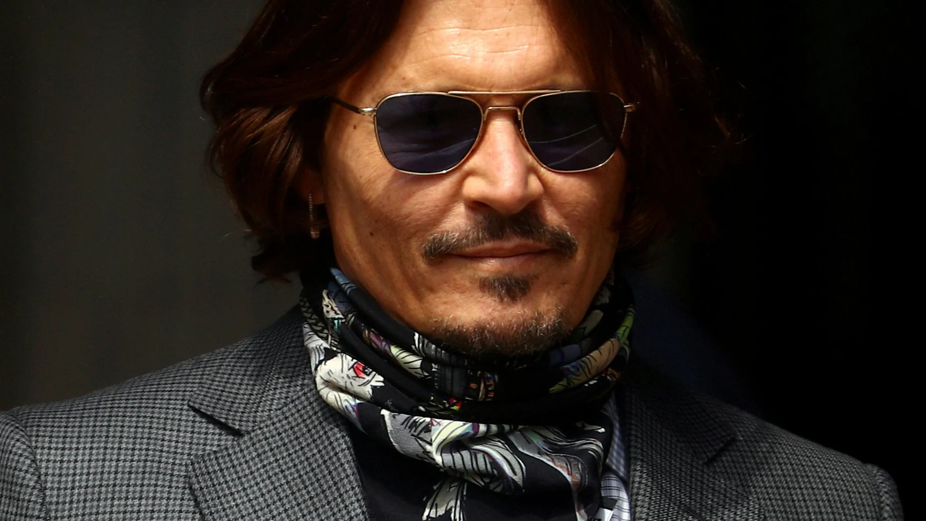 FILE PHOTO: Actor Johnny Depp arrives at the High Court in London, Britain July 23, 2020. REUTERS/Hannah McKay/File Photo