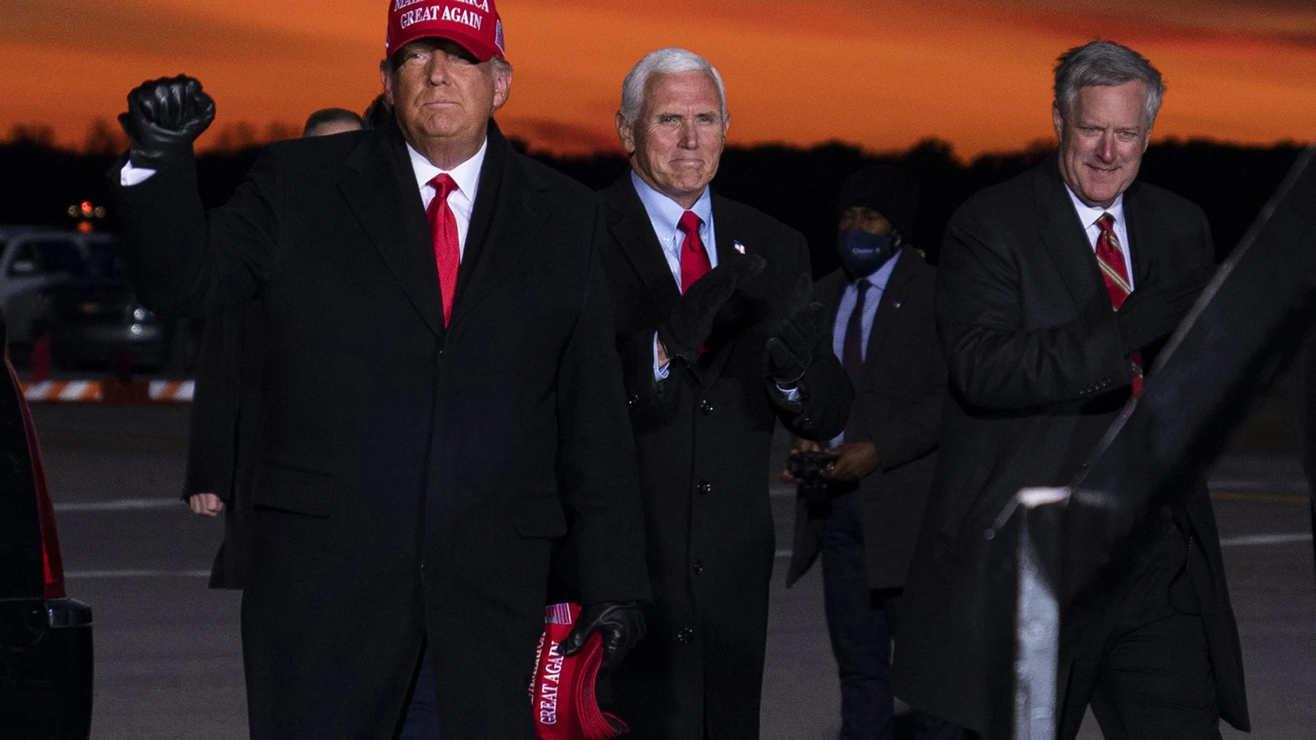 President Donald Trump and Vice President Mike Pence arrive for a campaign rally at Cherry Capital Airport