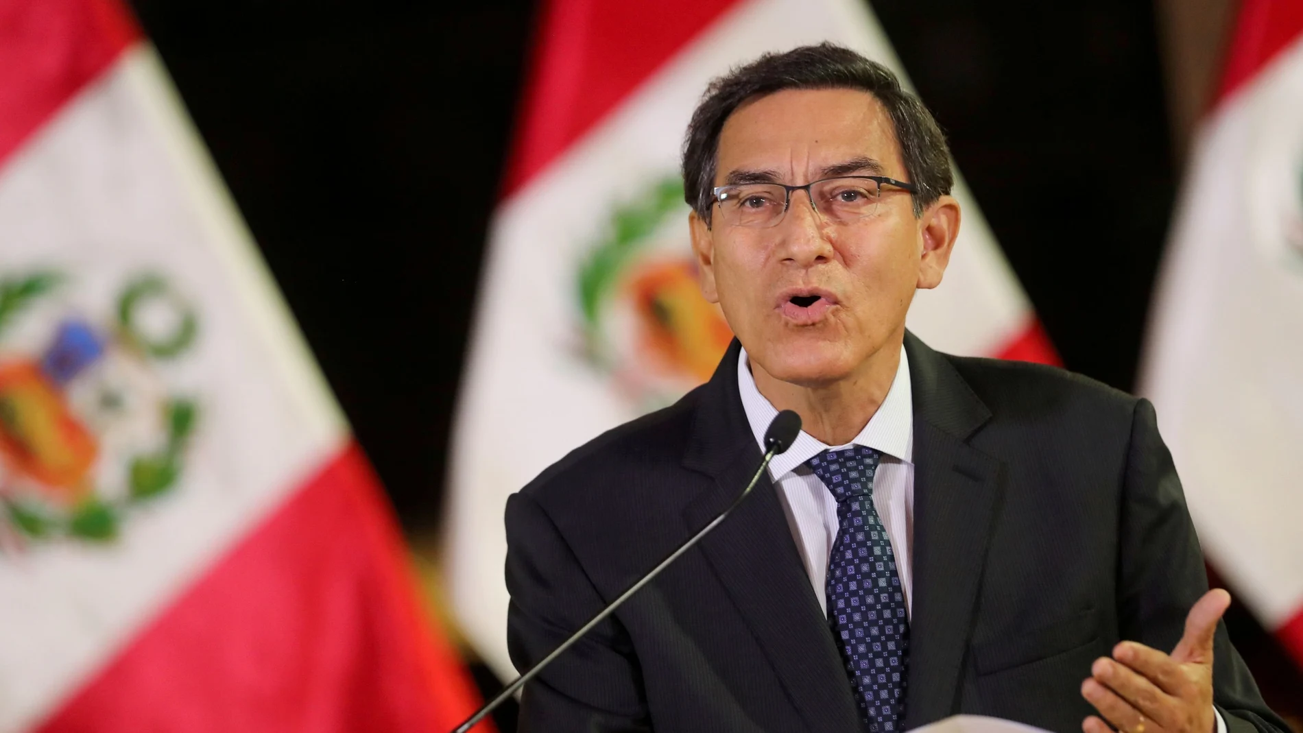FILE PHOTO: FILE PHOTO: Peru's President Martin Vizcarra addresses the nation, as he announces he was dissolving Congress, at the government palace in Lima, Peru September 30, 2019. Peruvian Presidency/Handout via REUTERS ATTENTION EDITORS/File Photo/File Photo