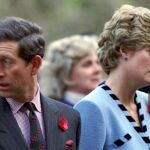 FILE PHOTO: Princess Diana and Prince Charles look in different directions, November 3, during a service held to commemorate the 59 British soldiers killed in action during the Korean War./File Photo