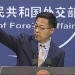 Chinese foreign ministry spokesperson Zhao Lijian gestures during a press briefing in Beijing on Monday, Nov. 23, 2020. China on Monday lashed out at Washington over its withdrawal from the "Open Skies Treaty" with Russia, saying the move undermined military trust and transparency and imperiled future attempts at arms control. (AP Photo/Liu Zheng)