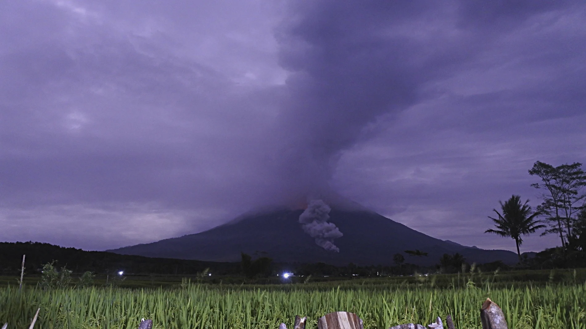 Volcanic materials spew from the crater of Mount Semeru in Lumajang, East Java, Indonesia, Tuesday, Dec. 1, 2020. Indonesian authorities are closely monitoring several volcanoes after sensors picked up increased activity in recent weeks, prompting the evacuation of thousands of people. (AP Photo)