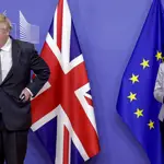 European Commission President Ursula von der Leyen, right, welcomes British Prime Minister Boris Johnson prior to a meeting at EU headquarters in Brussels, Wednesday, Dec. 9, 2020. Leaders of Britain and the EU meet Wednesday for a dinner that could pave the way to a post-Brexit trade deal, or tip the two sides toward a chaotic economic rupture at the end of the month. (Olivier Hoslet, Pool via AP)