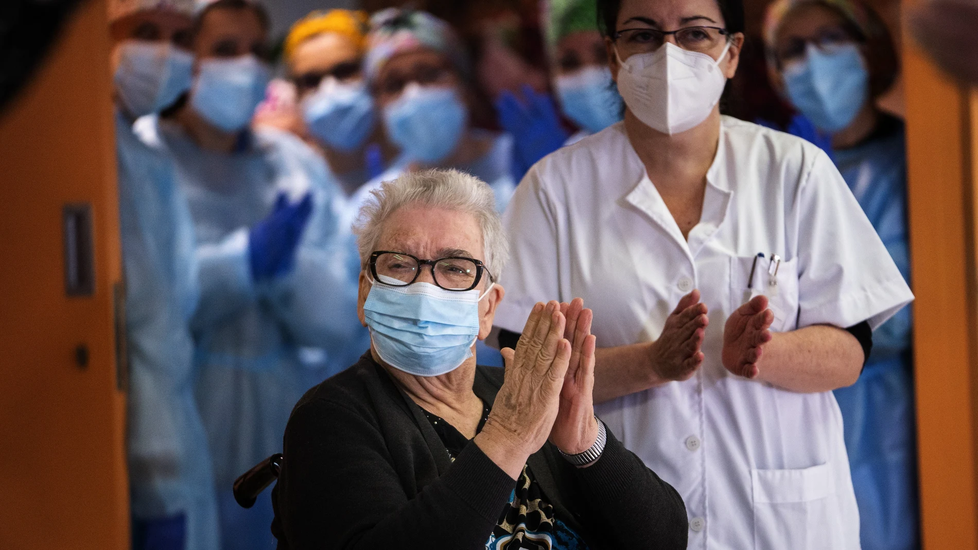 Josefa Perez, 89, reacts after being vaccinated against Coronavirus at a nursing home in l'Hospitalet de Llobregat in Barcelona, Spain, on Sunday, Dec. 27, 2020. The first shipments of coronavirus vaccines developed by BioNTech and Pfizer have arrived across the European Union, authorities started to vaccinate the most vulnerable people in a coordinated effort on Sunday. (AP Photo/Emilio Morenatti)