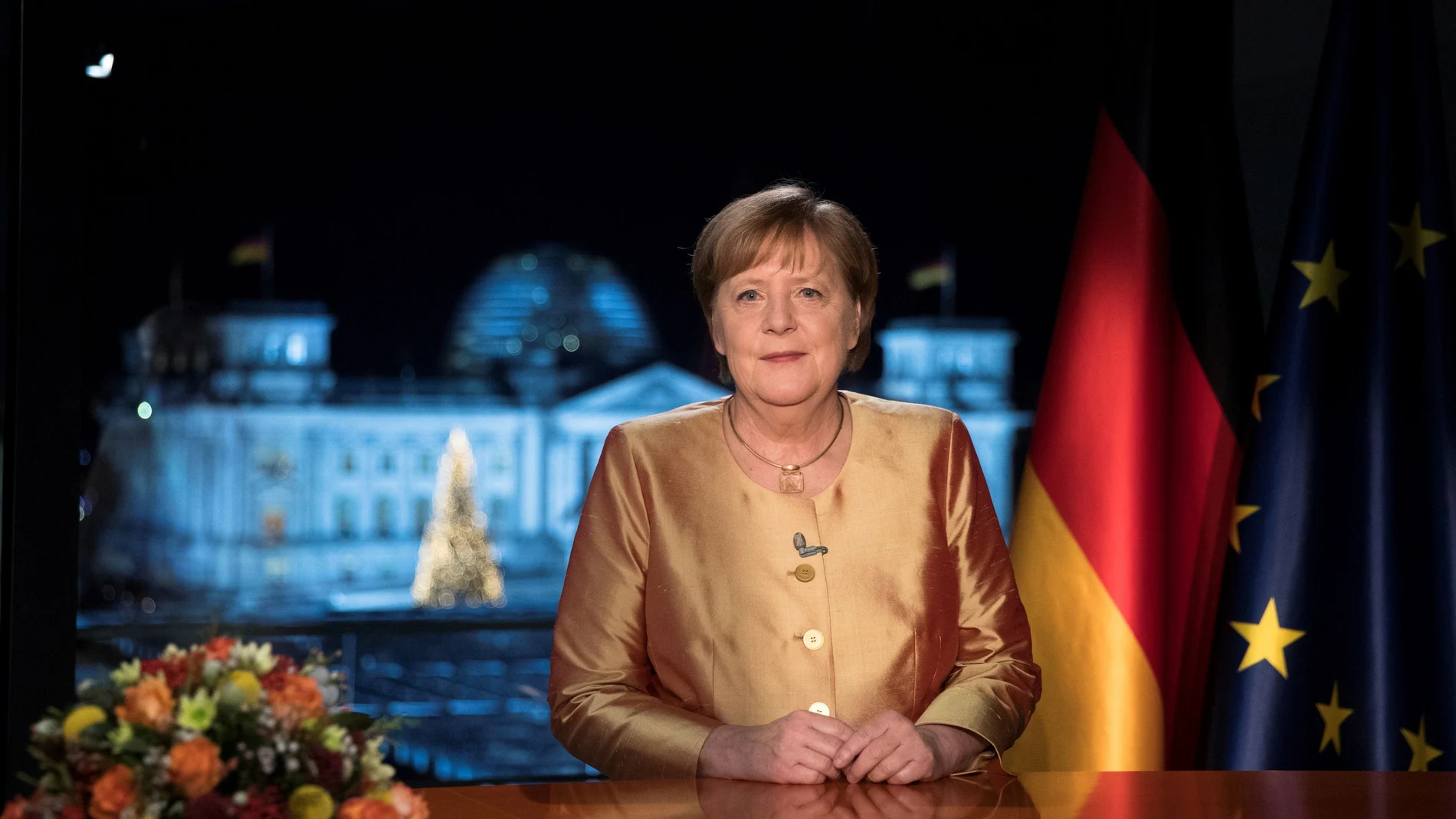 German Chancellor Angela Merkel poses for photographs after the television recording of her annual New Year's speech at the chancellery in Berlin, Germany December 30, 2020. Picture taken December 30, 2020. Markus Schreiber/Pool via REUTERS