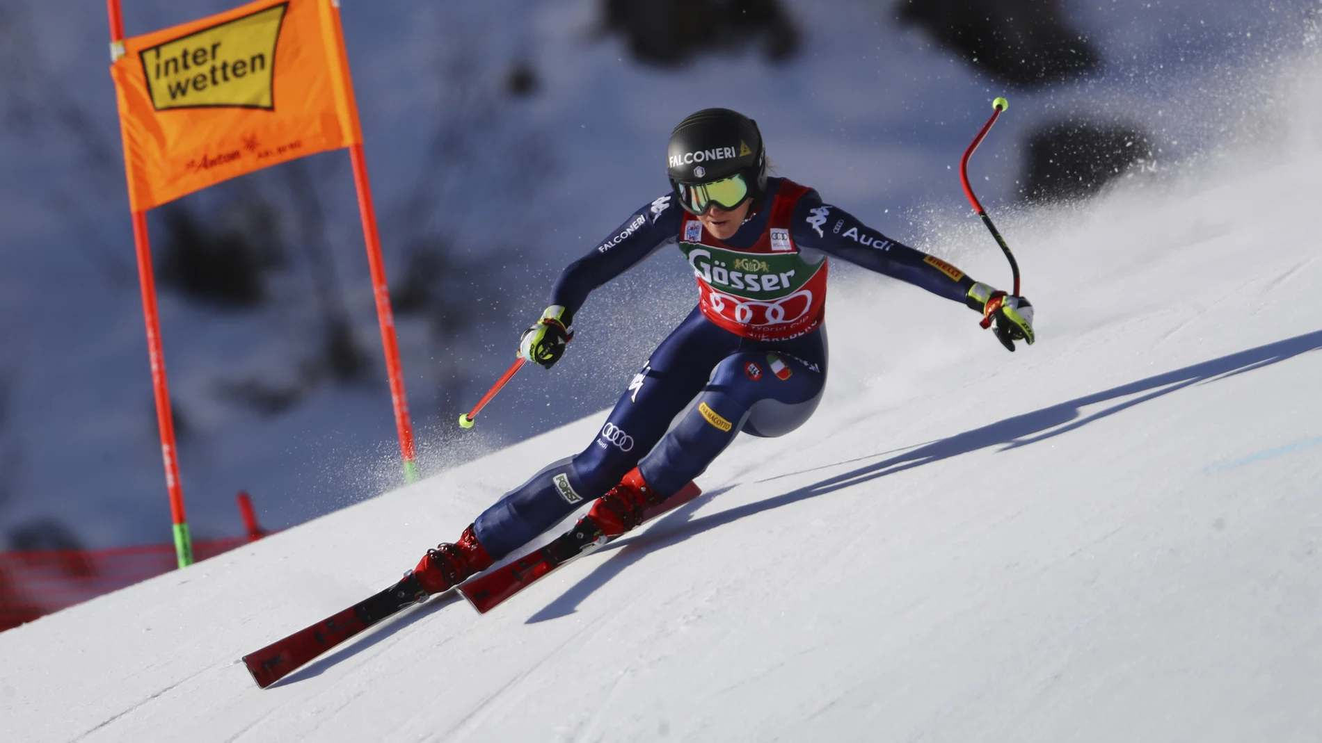 Italy's Sofia Goggia speeds down the course during an alpine ski, women's World Cup downhill in St. Anton, Austria, Saturday, Jan. 9, 2021. (AP Photo/Marco Trovati)
