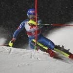 United States' Mikaela Shiffrin speeds down the course during an alpine ski, women's World Cup slalom in Flachau, Austria, Tuesday, Jan. 12, 2021. (AP Photo/Marco Trovati)