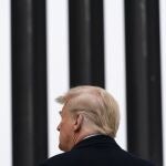 President Donald Trump tours a section of the U.S.-Mexico border wall, Tuesday, Jan. 12, 2021, in Alamo, Texas. (AP Photo/Alex Brandon)