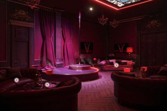 La sala roja, incluye un escenario y una barra de striptease