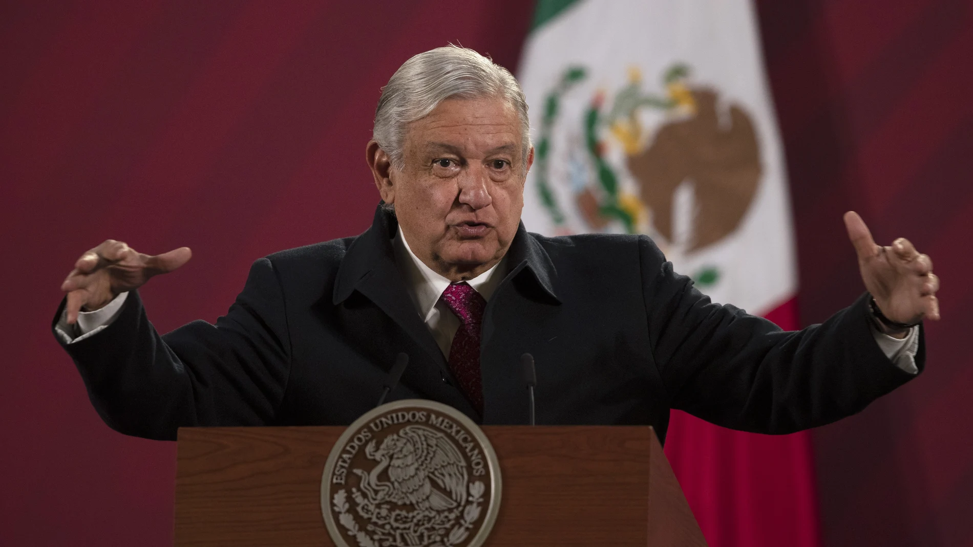 FILE - In this Dec. 18, 2020 file photo, Mexican President Andres Manuel Lopez Obrador gives his daily, morning news conference at the presidential palace, Palacio Nacional, in Mexico City. Mexico President AndrÃ©s Manuel LÃ³pez Obrador says he has tested positive for COVID-19 and is under medical treatment, Sunday, Jan. 24, 2021. (AP Photo/Marco Ugarte, File)