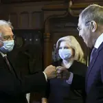 In this photo released by the Russian Foreign Ministry Press Service, Russian Foreign Minister Sergey Lavrov, right, and High Representative of the EU for Foreign Affairs and Security Policy Josep Borrell wearing a face mask to protect against coronavirus, greet each other prior to their talks in Moscow, Russia, Friday, Feb. 5, 2021. The European Union&#39;s top diplomat expressed hopes Friday that the COVID-19 vaccine developed by Russia will soon be used across the 27-nation bloc. During a visit to Moscow, EU foreign affairs chief Josep Borrell said the Sputnik V vaccine is &quot;good news for the whole mankind.&quot; (Russian Foreign Ministry Press Service via AP)