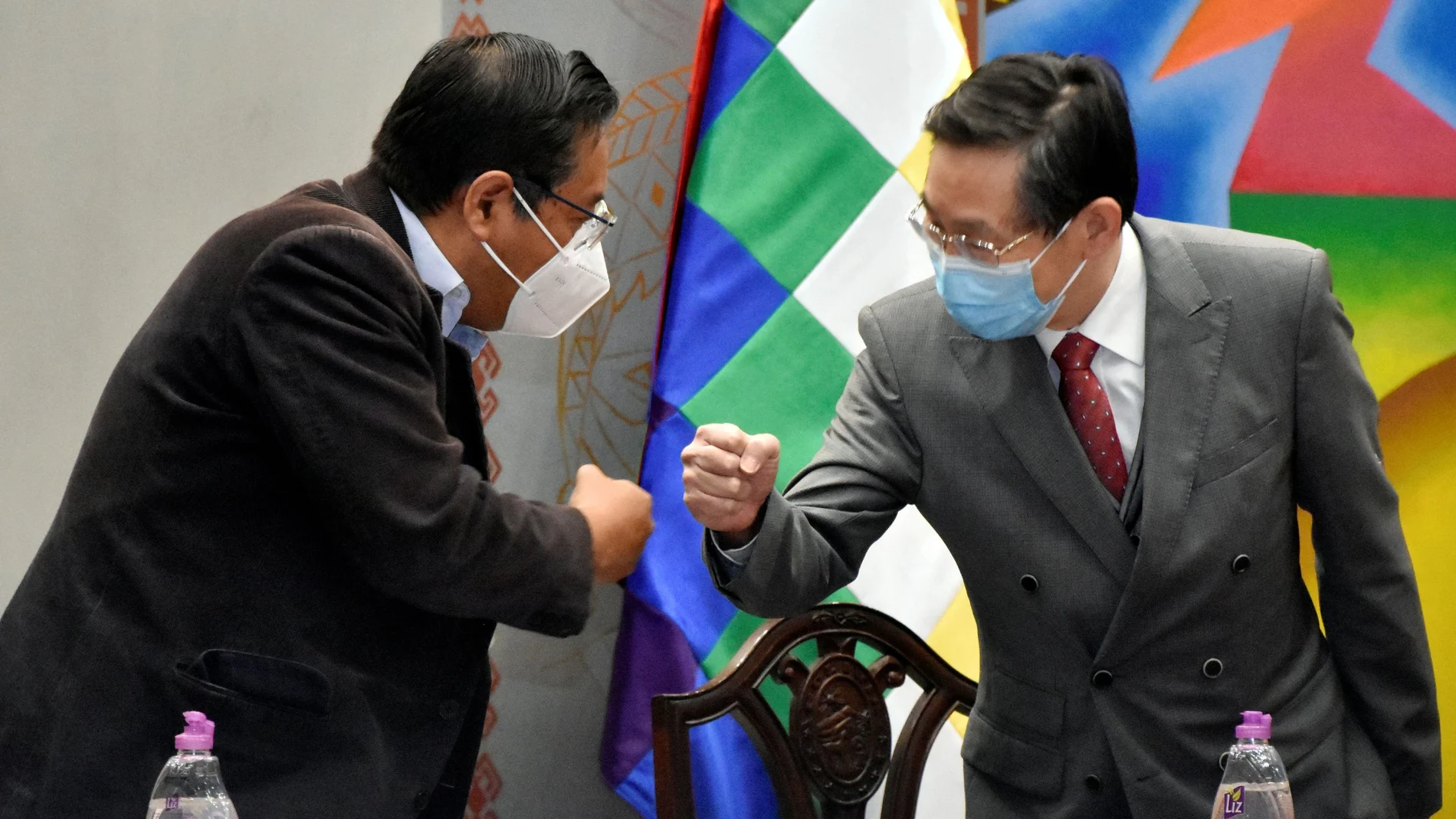 Bolivia's President Luis Arce greets China's Ambassador Huang Yazhong during a ceremony of the agreement with Chinese Sinopharm, locking in an initial supply of half a million doses of the company's vaccine against the coronavirus disease (COVID-19), at the Casa Grande del Pueblo palace in La Paz, Bolivia, February 11, 2021. Courtesy of Bolivian Presidency/Jorge Mamani/Handout via REUTERS ATTENTION EDITORS - THIS IMAGE WAS PROVIDED BY A THIRD PARTY. NO RESALES. NO ARCHIVES