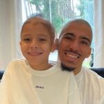Allan Marques, junto al pequeño Miguel