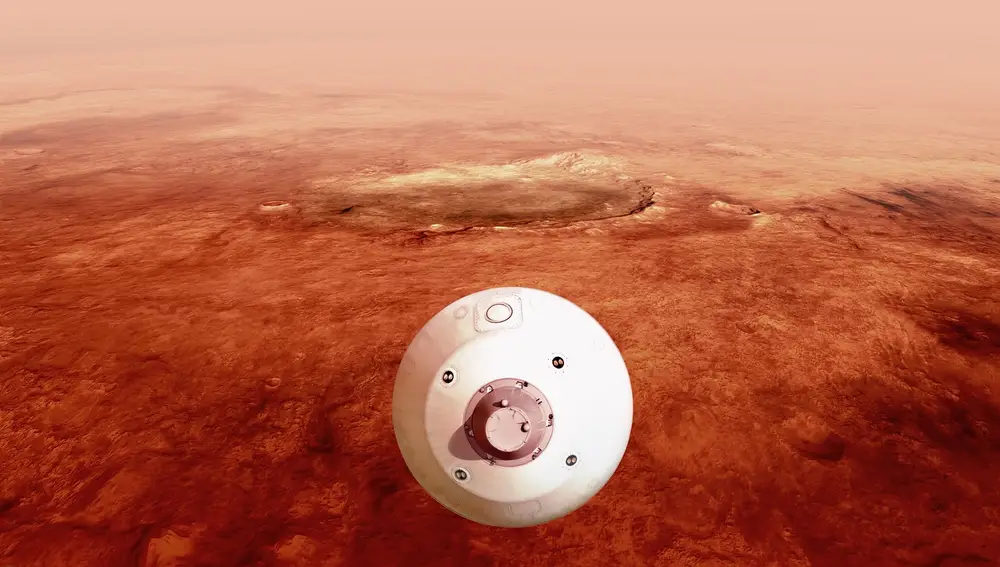 Fotografía cedida por la Administración Nacional de Aeronáutica y el Espacio (NASA) donde aparece una ilustración del &quot;aeroshell&quot; que contiene el rover Perseverance mientras gira en preparación para un aterrizaje seguro sobre la superficie de Marte.