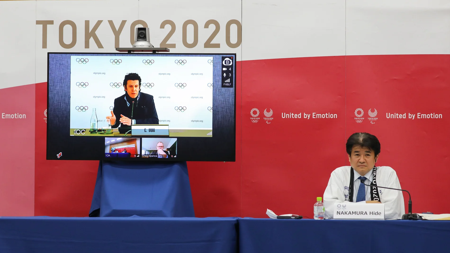 Tokyo (Japan), 17/02/2021.- Christophe Dubi (on the screen), Olympic Games Executive Director, speaks remotely during the International Olympic Committee (IOC), the International Paralympic Committee (IPC) and the Tokyo Organising Committee of the Olympic & Paralympic Games (Tokyo 2020) joint press briefing in Tokyo, Japan, 17 February 2021 (issued 22 February 2021). Tokyo 2020, IOC and IPC hosted a joint working meeting via teleconference focusing COVID-19 countermeasures during 15-17 this month. (Japón, Tokio) EFE/EPA/Du Xiaoyi / POOL