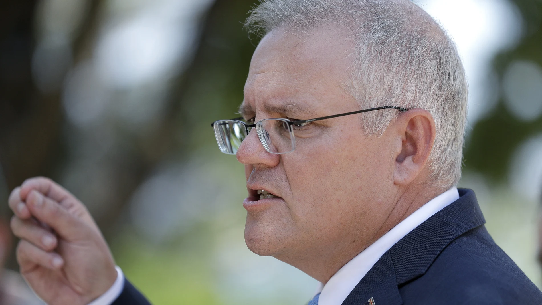 Australia's Prime Minister Scott Morrison speaks to the media in Sydney, Monday, March 1, 2021. Morrison stood by an unnamed Cabinet minister against calls for him to step down from office over an allegation that he raped a 16-year-old girl more than 30 years ago. (AP Photo/Rick Rycroft)