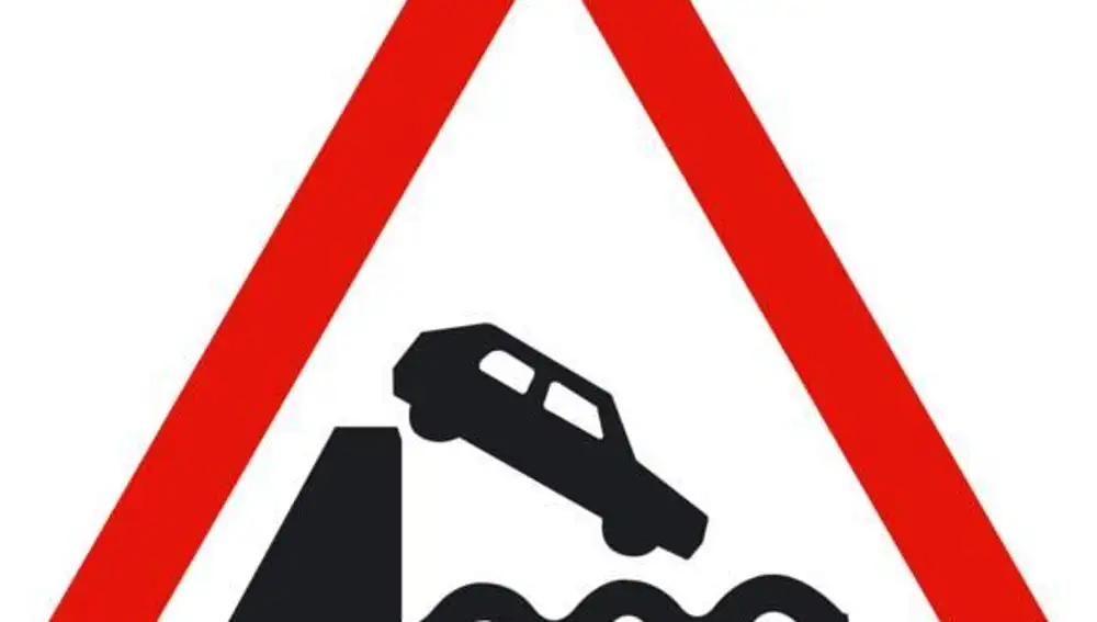 La señal P27 advierte a los conductores de que la carretera termina en un muelle o en una corriente de agua