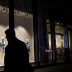A man walks past a store of the Swedish fashion retailer H&M at a shopping mall in Beijing, China March 24, 2021. REUTERS/Florence Lo