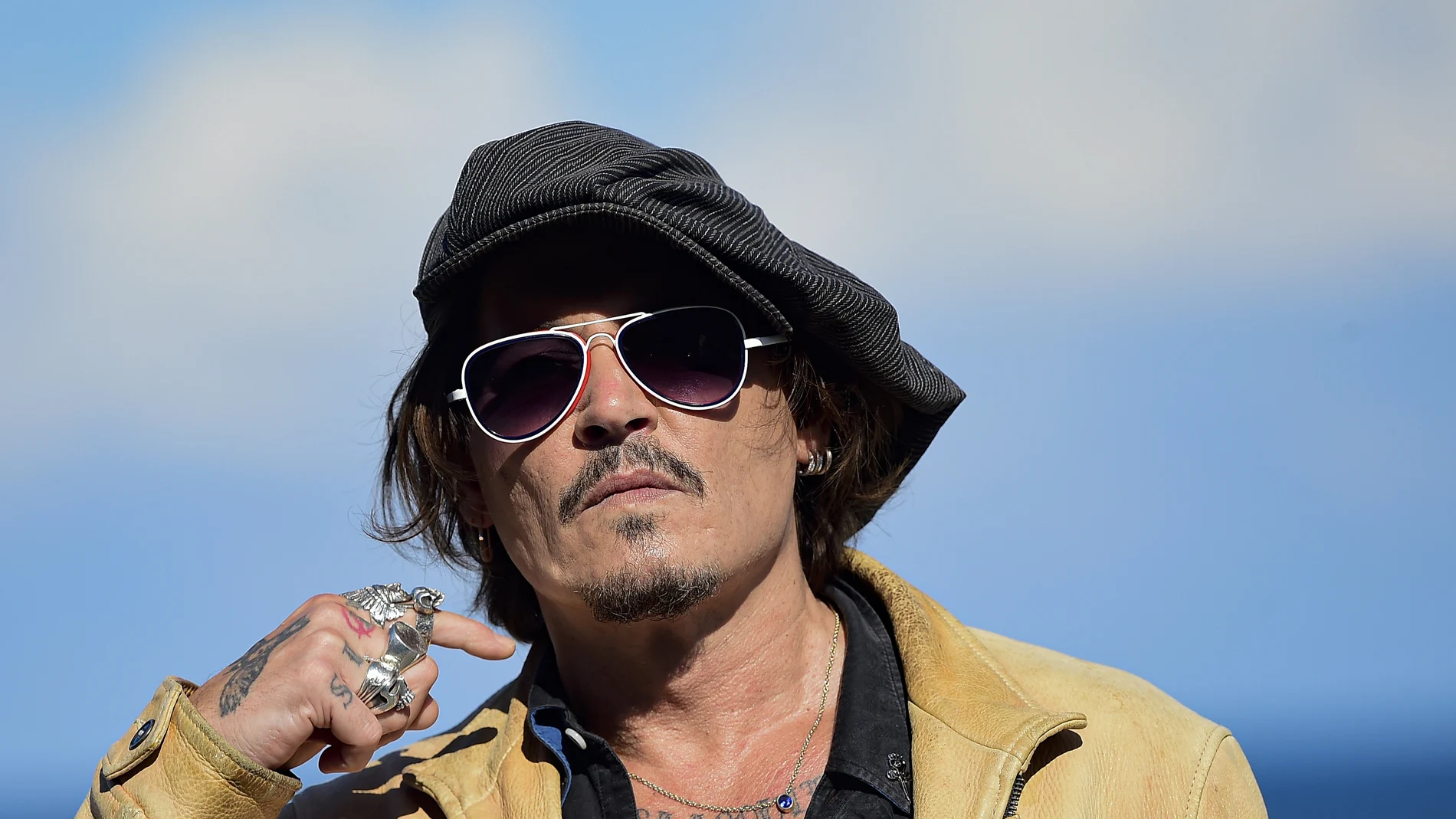 FILE - In this file photo dated Sunday, Sept. 20, 2020, US actor and film producer Johnny Deep during the photocall for his film "Crock of Gold: A Few Rounds with Shane Macgoman" at the 68th San Sebastian Film Festival, in San Sebastian, northern Spain. Appeal judges said the Hollywood star cannot challenge the High Courtâ€™s rejection of his libel lawsuit against publisher of The Sun newspaper for labeling him a â€œwife beaterâ€ in an article. High Court Justice Andrew Nicol ruled in November that allegations against Depp, made in a April 2018 article, were â€œsubstantially true.â€ The judges said Thursday that the earlier court hearing was â€œfull and fairâ€ and the justiceâ€™s conclusions â€œhave not been shown even arguably to be vitiated by any error of approach or mistake of law.â€ (AP Photo/Alvaro Barrientos, File)