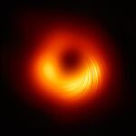 Una vista del agujero negro supermasivo M87 en luz polarizada: las líneas marcan la orientación de la polarización, que está relacionada con el campo magnético alrededor de la sombra del agujero negro.