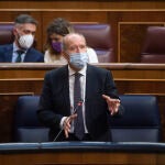 El ministro de Justicia, Juan Carlos Campo Moreno, interviene en una sesión plenaria en el Congreso de los Diputados, a 20 de mayo de 2021, en Madrid, (España).
