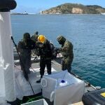 Ejercicio de emergencia y buceo en aguas contaminadas en Cartagena