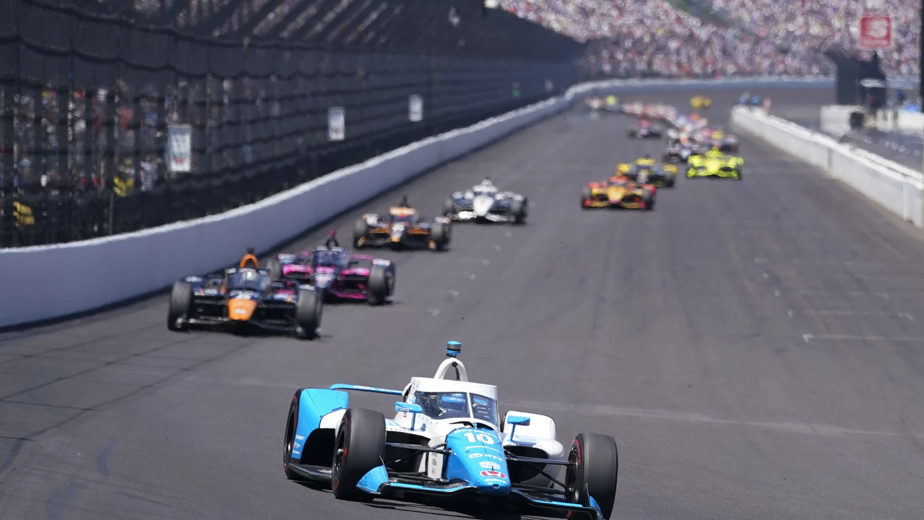 Alex Palou, of Spain, drives into Turn 1 during the Indianapolis 500 auto race at Indianapolis Motor Speedway, Sunday, May 30, 2021, in Indianapolis. (AP Photo/Darron Cummings)