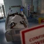 A COVID-19 patient lies in the ICU of the Posta Central Hospital in Santiago, Chile, Friday, June 4, 2021. Chile's Health Ministry reported on Friday that 97% of the nation's ICU hospital beds are full the majority with COVID-19. (AP Photo/Esteban Felix)