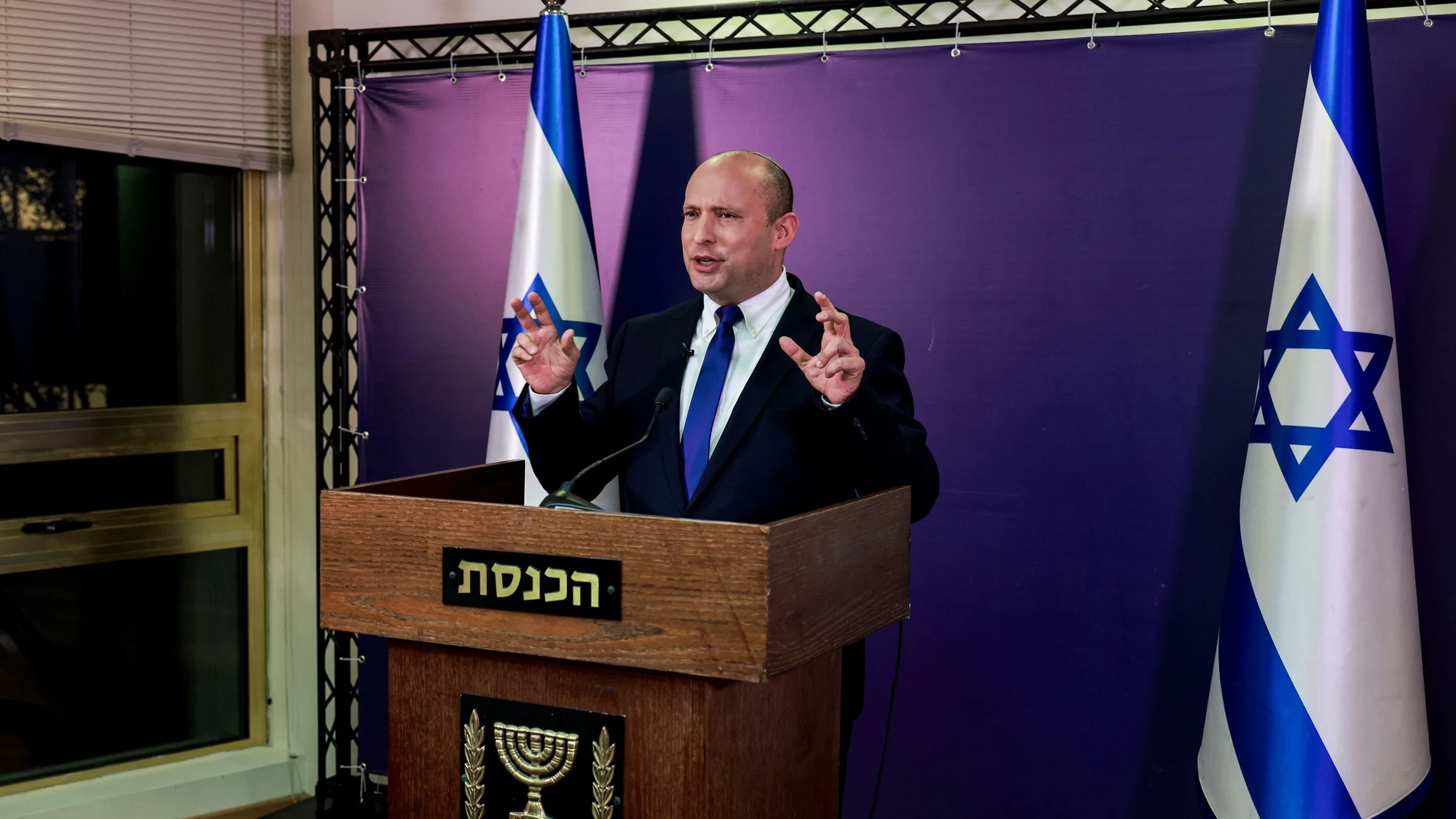 Naftali Bennett, Israeli parliament member from the Yamina party, gestures as he gives a statement at the Knesset, Israel's parliament, in Jerusalem, June 6, 2021. Menahem Kahana/Pool via REUTERS