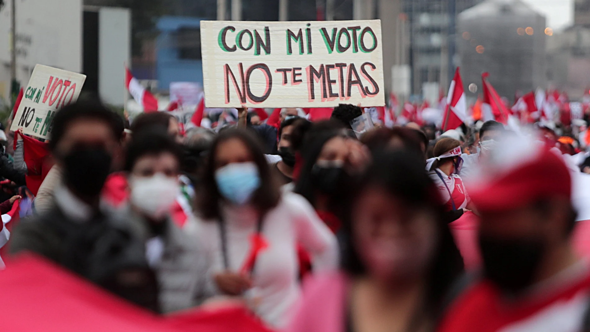 A sign that reads "Don't mess up with my vote" is displayed as supporters of Peru's presidential candidate Keiko Fujimori gather in Lima, Peru, June 9, 2021. REUTERS/Sebastian Castaneda