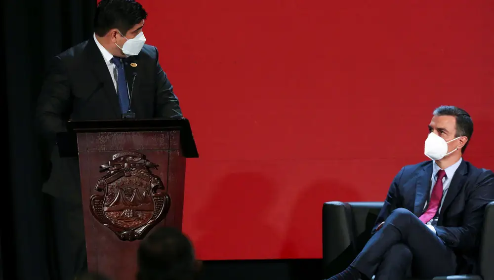 Costa Rican President Carlos Alvarado delivers a speech as Spain's Prime Minister Pedro Sanchez.
