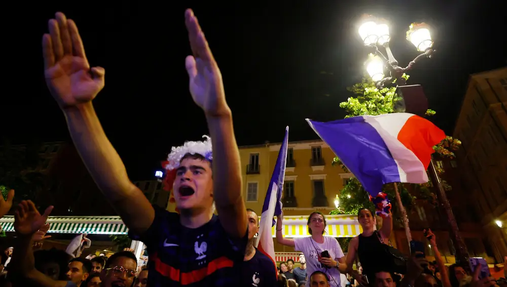 France fans celebrate after watching the UEFA EURO 2020 France vs Germany match on a screen, in Nice, France, June 15, 2021.