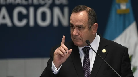 Guatemalan President Alejandro Giammattei speaks at a new facility to receive deported Guatemalans at La Aurora Air Force base during its inauguration ceremony also attended by U.S. Secretary of Homeland Security Alejandro Mayorkas in Guatemala City, Wednesday, July 7, 2021. (AP Photo/Moises Castillo)
