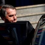 FILE PHOTO: Brazil's President Jair Bolsonaro gets in a vehicle after attending Mass at a Catholic church in Brasilia, Brazil July 1, 2021. REUTERS/Adriano Machado//File Photo