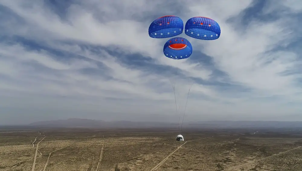 In this April 14, 2021 photo made available by Blue Origin, the New Shepard Crew Capsule descends from space on during a test in West Texas. (Blue Origin via AP)