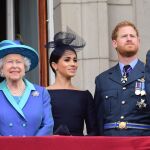 Meghan Markle, la reina Isabel II y el príncipe Harry