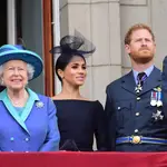 Meghan Markle, la reina Isabel II y el príncipe Harry