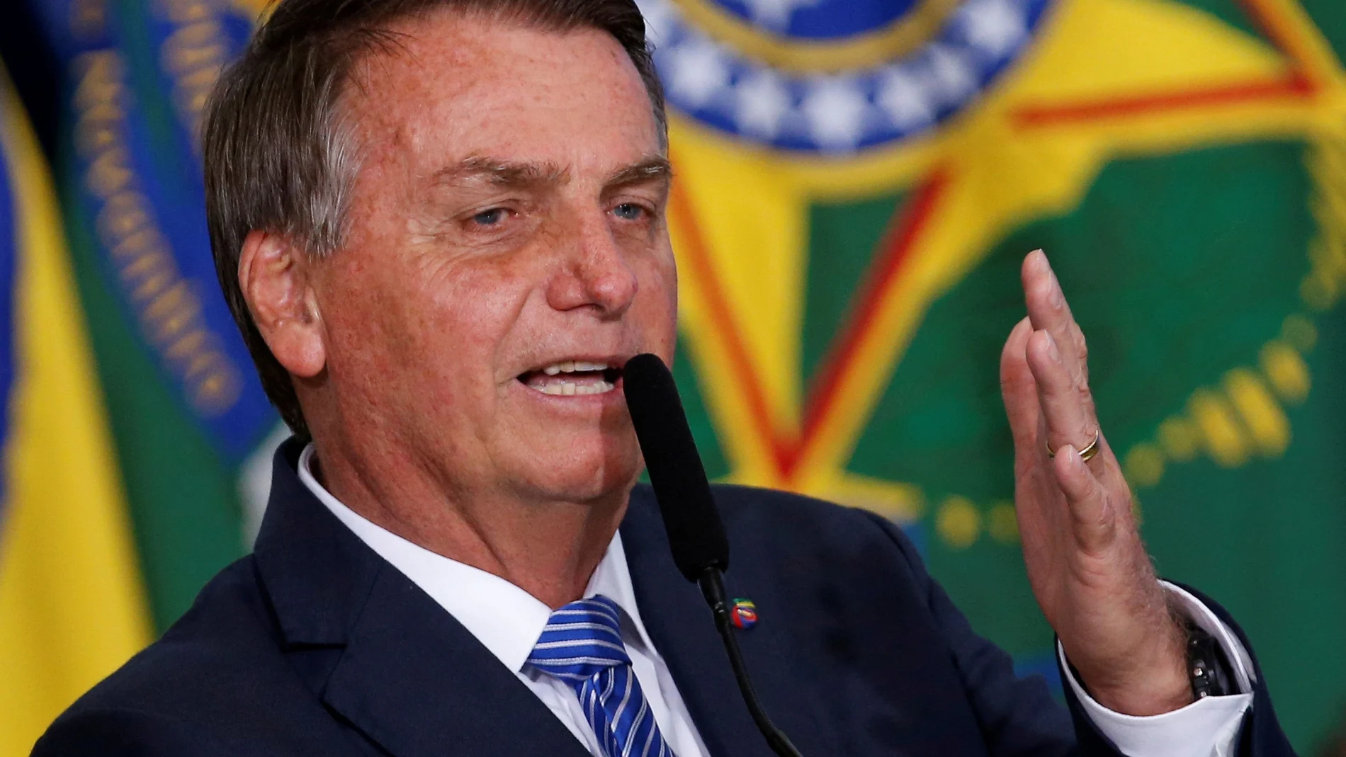 Brazil's President Jair Bolsonaro speaks during the inauguration ceremony of his new chief of staff at the Planalto Palace in Brasilia, Brazil August 4, 2021. REUTERS/Adriano Machado